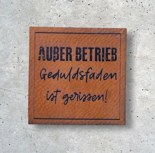 Kunstlederlabel AUSSER BETRIEB…